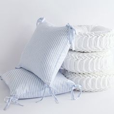 four pillows stacked on top of each other