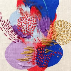 an abstract painting with different colors and patterns on it's surface, including red, purple, blue, and gold