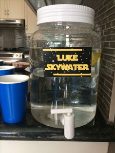 there is a large water bottle with a label on it that says luke skywater