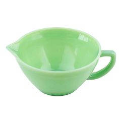 a green bowl on a white background