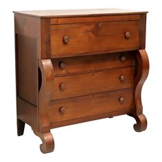 a wooden dresser with three drawers on one side and an open drawer on the other