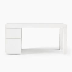 a white desk sitting on top of a white floor