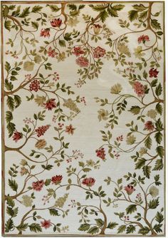 a white rug with red and green flowers on the bottom, surrounded by leaves and branches