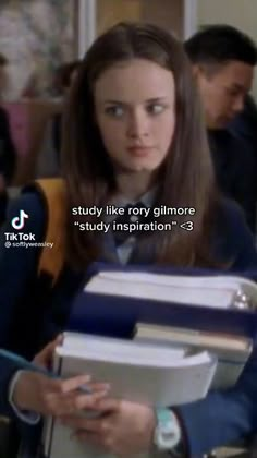 a woman holding books in her hands with the caption, study like roxy climers's study inspiration 3