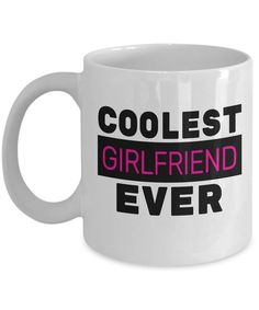 a white coffee mug with the words coolest girl friend ever in pink and black