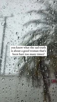 a person holding an umbrella with the words you know what the bad truth is about a good woman