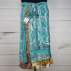 Nwt Darn Good Yarn Brand Recycled Sari Silk Wrap Skirt. Reclaimed Material From Used Saris. Tea Length (Approx. 34 In. Long). Dgy Size Goddess (Us Size 14-32). Reclaimed Material Means Flaws (Stains, Holes, Ink Errors, Thread Pulls, Etc.) Are Common And Expected! I List What I See, But May Miss Some. Silver Glitter Dots On Overskirt. Aqua Overskirt Slightly More Green, Less Blue In Person. Pinholes, Thread Pull, Thread Separations On Overskirt. Multiple Thread Pulls Throughout Underskirt. Spring Flowy Turquoise Skirt, Spring Turquoise Flowy Skirt, Turquoise Lined Skirt Bottoms For Spring, Turquoise Skirt For Spring, Blue Flowy Lined Wrap Skirt, Turquoise Spring Skirt, Flowy Blue Wrap Skirt, Blue Tiered Lined Wrap Skirt, Spring Turquoise Lined Skirt