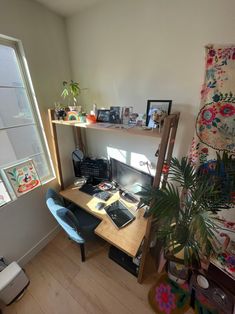 a room with a desk, chair and window