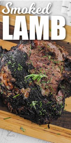 a grilled lamb on a cutting board with the words smoked lamb