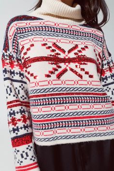 Celebrate the holiday season in style with our Cream Christmas Sweater. Embellished with a charming Christmas-themed print in red and blue, this sweater is adorned with sparkling sequin details, making it the perfect pick for your festive gatherings. Festive Design: The sweater showcases a delightful Christmas style print, enhanced with eye-catching sequin details for a touch of holiday sparkle. Cozy Turtle Neck: Stay warm and stylish with the chunky turtle neck design, perfect for those chilly Christmas Sequin Top For Festive Occasions, Sequin Top For Christmas Holiday, Red Sequined Top For Christmas, Festive Holiday Sweater With Crew Neck, Festive Holiday Crew Neck Sweater, White Festive Holiday Sweater, White Holiday Festive Sweater, Festive Christmas Fair Isle Sweater, Festive Fair Isle Christmas Sweater