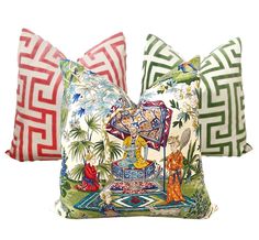 two decorative pillows with different designs on them