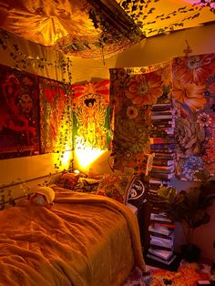 a bed room with a neatly made bed and lots of tapes on the wall above it