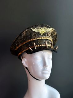 Our captain hat boasts an authentic steampunk aesthetic. Intricate gears, cogs, and spike elements adorn the hat, transporting you to an era of innovation and daring feats.


Age Group/Gender - Adult/Unisex

Size/Type - One size fits all adults

Mask Color - Gold Steampunk Captain, Steampunk Pilot, Captain's Hat, Pilot Hat, Steampunk Aesthetic, Steampunk Hat, Steampunk Cosplay, Masks Masquerade, Type One