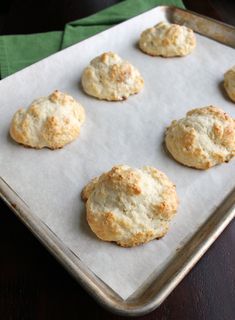 six biscuits on a baking sheet ready to be baked