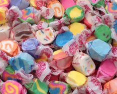 many different colored candies are on display