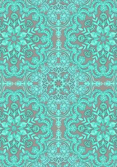 a green and gray background with an intricate design