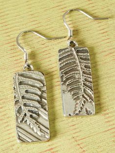 Eye-Catching Earrings With a Beautiful Hand-Cast Relief Pattern of Vermont Fiddleheads and Ferns Aluminium Jewellery, Silver Forest Earrings, Fiddlehead Fern, Fern Earrings, Pewter Casting, Funny Stocking Stuffers, Unique Christmas Stockings, Precious Metal Clay Jewelry, Classic Perfumes