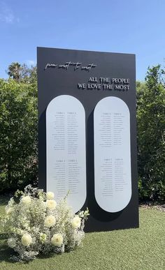 the memorial sign for all the people we love the most in front of some bushes