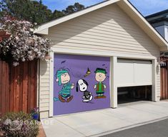 a garage door decorated with cartoon characters painted on it