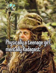 a man with long hair wearing a hat and holding a stick in his hand that says, physically a teenage girl mentally radagast