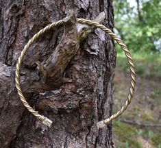 Viking Twisted Dragonhead Torc Neck ring Medieval Necklace Norse Pagan jewellery Nice and solid brass Torc, made from two solid brass rods, twisted together and decorated with smaller braided wire. The dragonheads are made using Lost Wax Casting method and then soldered to ends of the torc. The torc can be bended to fit better for person wearing it. Made from brass. Lotr Oc, Dragon Woman, Torc Necklace, Brass Rods, Medieval Necklace, Neck Ring, Norse Pagan, Pagan Jewelry, Gold Dragon