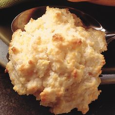 a close up of a spoon with food on it