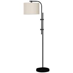 a black floor lamp with a white shade