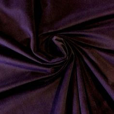 a close up view of a purple fabric