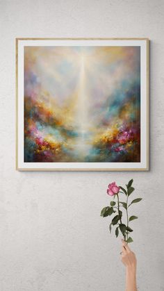 Abstract artwork with radiant light piercing through misty pink, gold, and blue hues, revealing a mystical path and blossoms of energy.