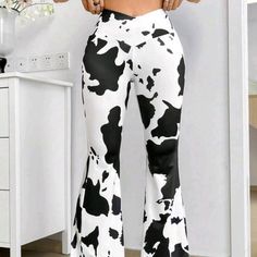 Black & White Coolane Womens Cow Print Hi-Waist Flare Leg Pants 95% Polyester 5% Elastane Cow Pants, Trendy Fitted White Bottoms, White High-waist Fitted Pants, Cow Print Clothing, Trendy Fitted White Pants, White Fitted High Waist Pants, Fitted High Waist White Pants, Fitted White Bottoms With Elastic Waistband, Trendy High Waist White Bottoms