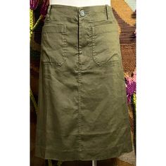 New With Tags Size Xs This Chic Olive Green Skirt Is A Part Of Anthropologie’s Coveted Colette Line. The Skirt Has Two Front Utility Pockets & 2 Back Pockets. The Fabric Is 52% Linen, 46% Viscose, & 2% Elastane. The Closure Is A Double Button & Zipper Combination With A Snap Button Next To The Button To Keep The Waist Smooth. *** The Dress Form Is Wearing A Size Medium. Please See Measurements Below For The Size Xs Fit. In One Of The Pictures The Skirt Is Paired With Anthropologie Maeve Blouse ( Fitted Green Cargo Skirt For Spring, Fitted Knee-length Cargo Skirt For Summer, Chic Long Fitted Cargo Skirt, Fitted Cotton Cargo Skirt With Lined Detail, Fitted Cotton Cargo Skirt With Lining, Fitted Green Cargo Skirt With Lining, Fitted Cargo Pencil Skirt For Spring, Chic Fitted Green Cargo Skirt, Fitted Cotton Lined Cargo Skirt