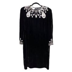 Vintage 90s Glam Holiday Velvet Sequin Embellished Dress Black Silver Size 12 Size 12 Approximate Measurements B 42” W 39” H 43” This Luxurious Black Velvet Dress Is Serving Up Lady Gaga From American Horror Story Hotel “The Countess” Vibes! Perfect For The Holidays Or Nye! The Neckline And Cuffs Are Embellished With Sequins And Beads. The Back Has A Hidden Zipper. The Brand Is Argenti Bin D Laurathrift88 On Poshmark Is A Curated Collection Of Clothes, Accessories And Home Goods For Anyone Who L American Horror Story Hotel, 90s Glam, The Countess, Black Velvet Dress, Size 12 Dress, Current Fashion, Horror Story, Dresses Vintage, Embellished Dress