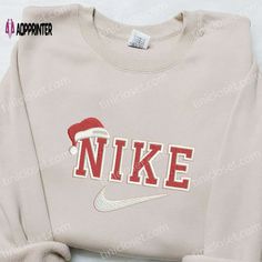 Introducing our Christmas Hat x Nike Embroidered Sweatshirt, the perfect blend of style and comfort for the festive season. Made with high-quality materials, this sweatshirt features an embroidered Christmas hat design, adding a unique touch to your holiday outfit. Stay cozy and fashionable with the Nike logo proudly displayed. With its versatile design, this sweatshirt can be paired with jeans or leggings for a casual yet trendy look. Make a statement this Christmas with our Christmas Hat x Nik Nike Embroidered Sweatshirt, Celebrity Shirts, Hat Design, Nike Sweater, Nike Sweatshirts, Sweatshirt Christmas, Christmas Hoodies, Embroidered Sweatshirt, Christmas Hat