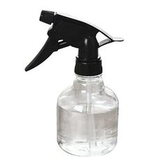 a spray bottle with scissors on it and a black plastic triggery head in the top