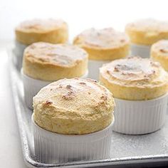 several cupcakes sitting on top of a metal tray