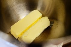 a piece of butter in a metal bowl