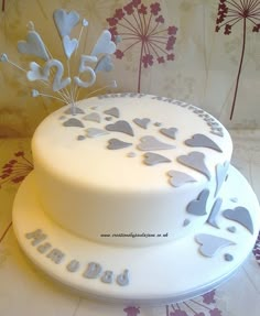 a white cake sitting on top of a table