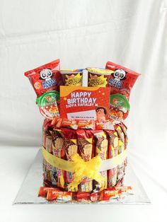 a birthday cake made to look like it is filled with candy