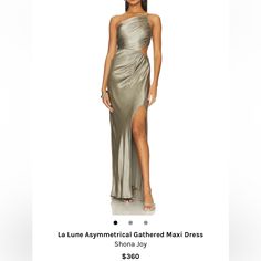 a woman in a silver dress is on the webpage for an advertise