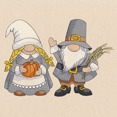 two gnomes are holding pumpkins in their hands