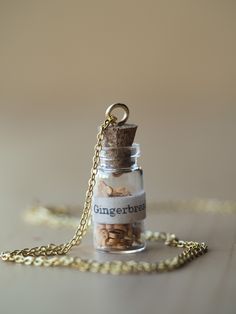 ABOUT:       "Gingerbread Jar Necklace" The gingerbread men in this jar are not edible and the cork does not come off. The cork is glued in to ensure that the necklace does not pop off and fall on the ground. This is just a cute little gingerbread men jar that can be purchased with or without the "Gingerbread" label. :) ~ CARE ~ -Do not get wet -Be sure to remove before showering, swimming, etc. -Avoid dropping on hard surfaces to prevent scratches or breakage. Gingerbread men are not edible Jar Necklace, Gifts In A Jar, Christmas Jars, Bottle Necklace, Gingerbread Men, Necklace Ideas, Jar Gifts, Wedding Jewellery Necklace, Wedding Necklaces