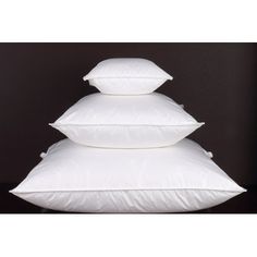 three pillows stacked on top of each other