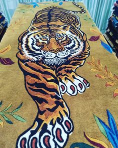 a tiger rug is on display in a store