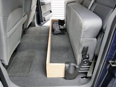 the interior of a van with seats folded down