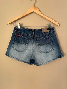 "Small Measurements in inches:  Waist: 28\" Length: 10\" Front Rise:9\"" Y2k Low Rise Shorts, Grunge Jean Shorts With Built-in Shorts, Y2k Jean Shorts For Streetwear, Y2k Mid-rise Cotton Shorts, Y2k Style Short Jean Shorts For Streetwear, Y2k Style Mid-rise Cotton Shorts, Y2k Style Streetwear Shorts, Y2k Streetwear Cutoff Bottoms, Y2k High-waist Jean Shorts For Streetwear