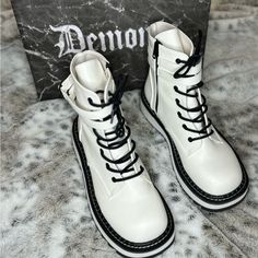 Demonia Boots - Lilith - White Vegan Leather Platform Boots Size 10 Brand New In The Box, Never Worn!! Only Tried On Once In My House. In Perfect Condition!! I Bought Them Full Price And Hope To Get Close To What I Paid Back. They Are Completely Sold Out Online! Trendy White Moto Boots With Round Toe, Casual White Martin Boots In Faux Leather, White Trendy High Ankle Moto Boots, Trendy White Ankle Moto Boots, Trendy White Faux Leather Martin Boots, Casual White Faux Leather Martin Boots, Casual High-top White Moto Boots, Casual White High-top Moto Boots, Trendy White Leather Lace-up Boots