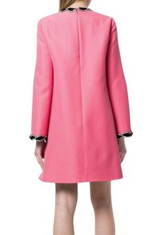 This velvet trim dress is a perfect pop of colour for your next evening event.Crafted from a luxury bubblegum pink wool-silk blend, this Gucci dress features a round neck, a back zip fastening, long sleeves, a flared style and is decorated with a velvet and crystal weave style trimming to the neckline and cuffs for added feminine edge.Composition Wool 51%, Silk 49%Lining: Acetate 71%, Silk 29%Made in Italy Spring Pink Gucci Dress, Gucci Pink Dress For Spring, Gucci Pink Spring Dress, Chic Pink Gucci Dress, Long Sleeve Gucci Dresses For Fall, Gucci Dress, Runway Dresses, Weave Style, Velvet Trim