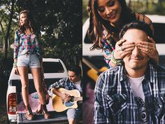 a man holding a guitar next to a woman on the back of a truck