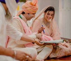 the bride and groom are getting ready for their wedding ceremony