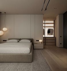 a large bed sitting next to two lamps in a bedroom